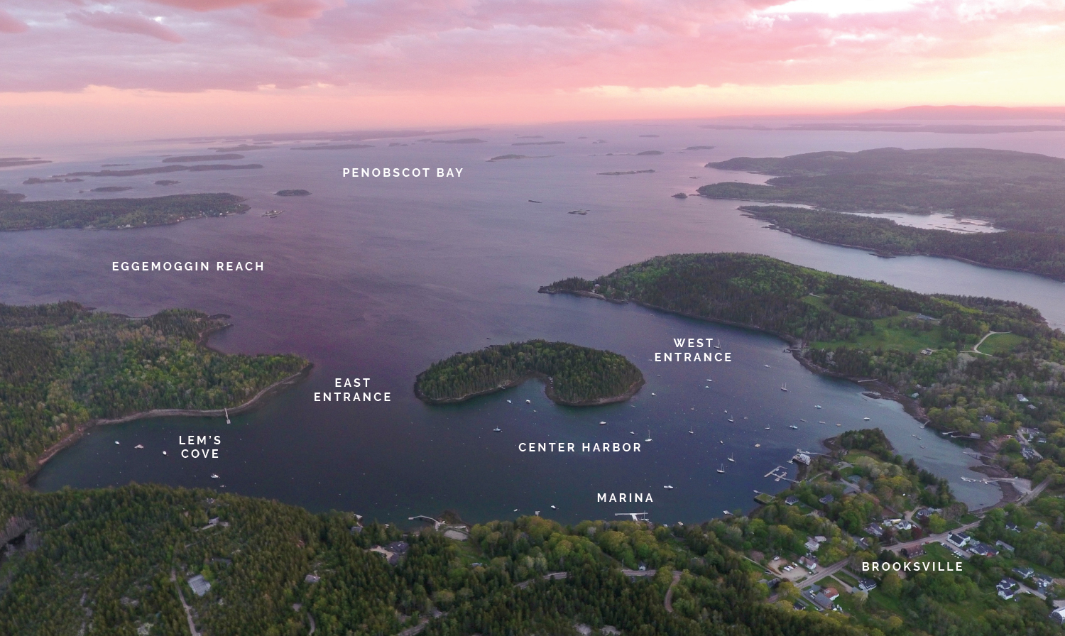 Aerial photograph of Buck's Harbor with text identifying the location of the marina